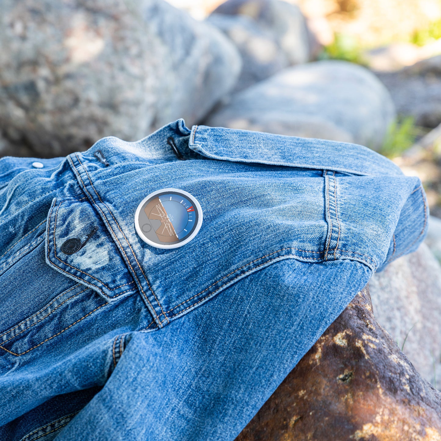 Attitude indicator pin button