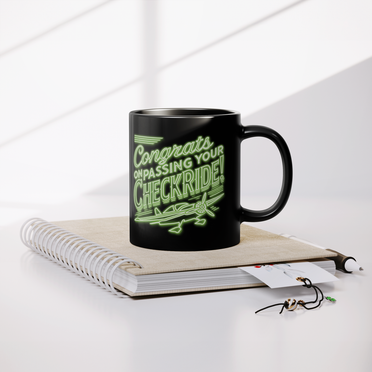 Congrats_on_passing_your_checkride_v1_Lifestyle_Notebook_Mockup.png