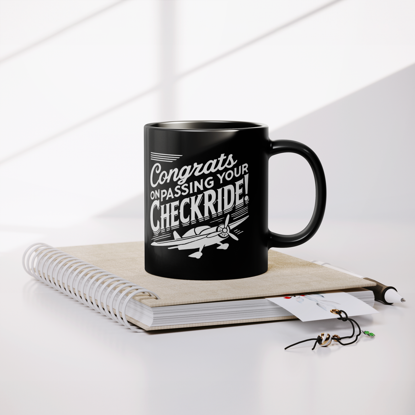 Congrats_on_passing_your_checkride_v1_Lifestyle_Notebook_Mockup.png