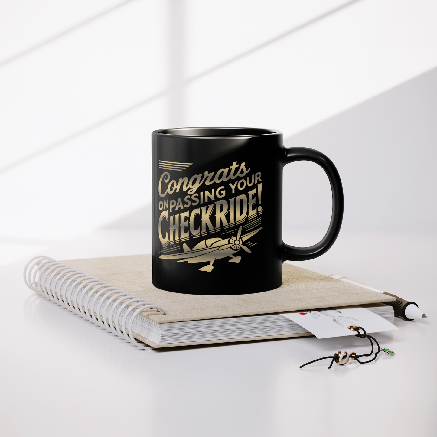 Congrats_on_passing_your_checkride_v1_Lifestyle_Notebook_Mockup.png
