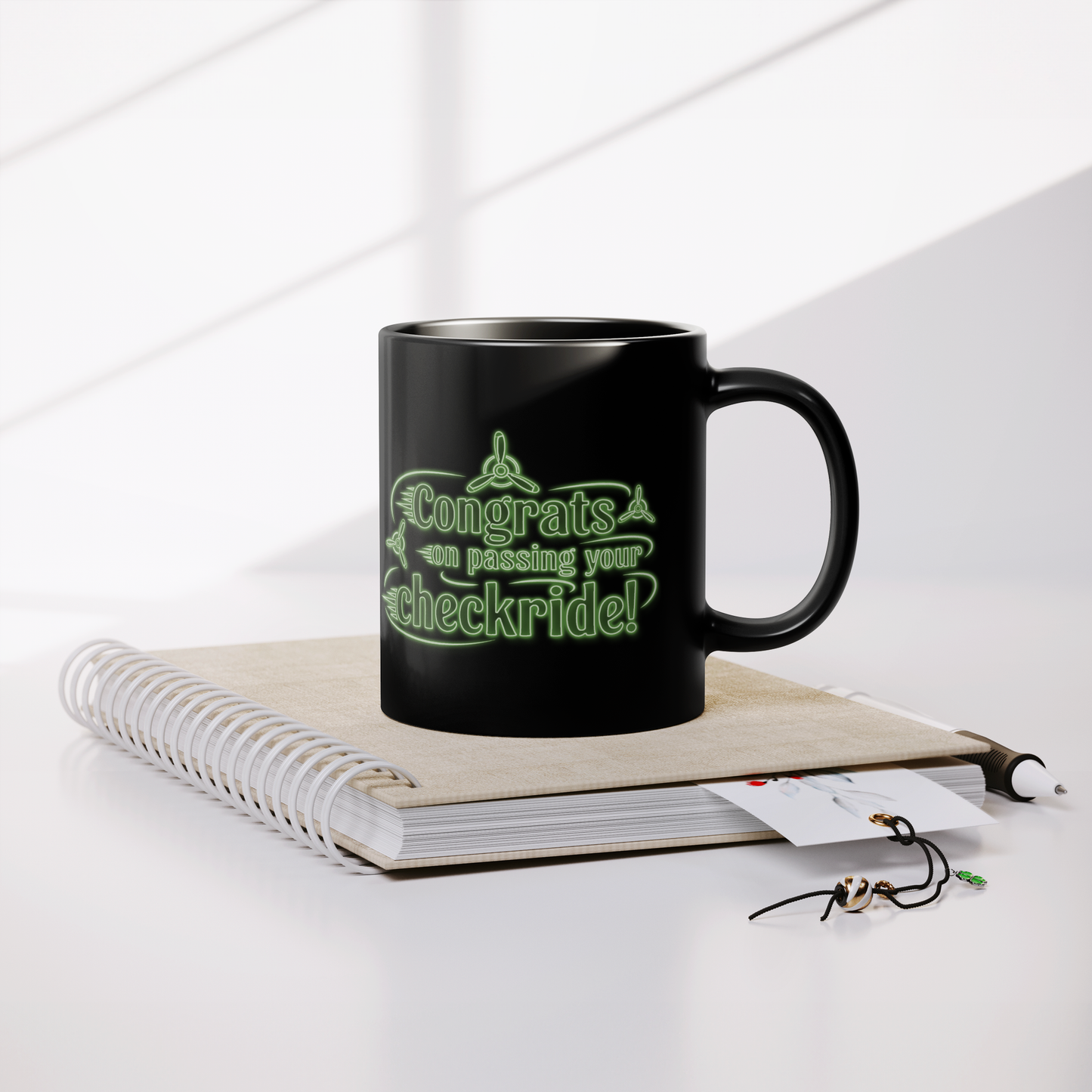 Congrats_on_passing_your_checkride_v3_Lifestyle_Notebook_Mockup.png
