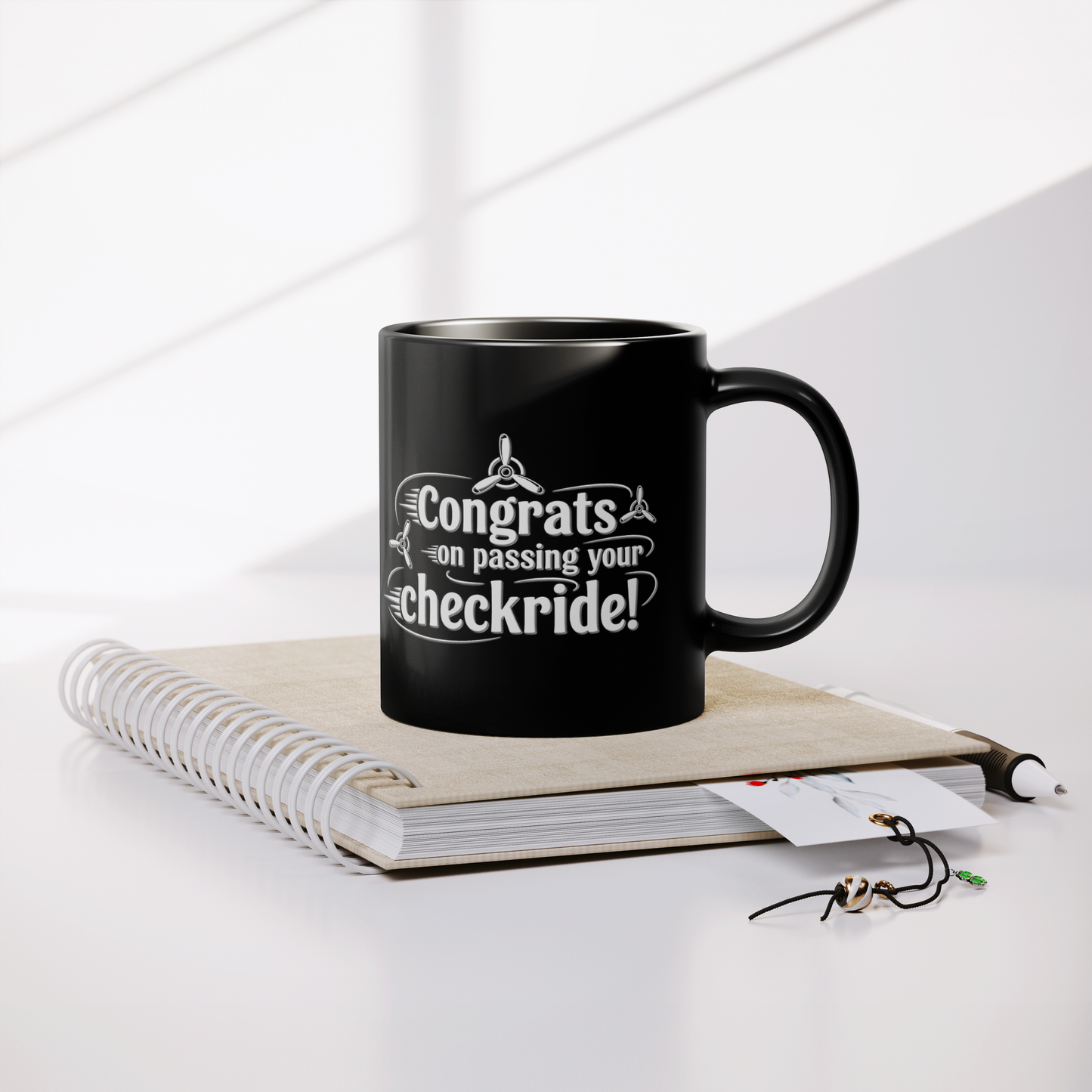 Congrats_on_passing_your_checkride_v3_Lifestyle_Notebook_Mockup.png