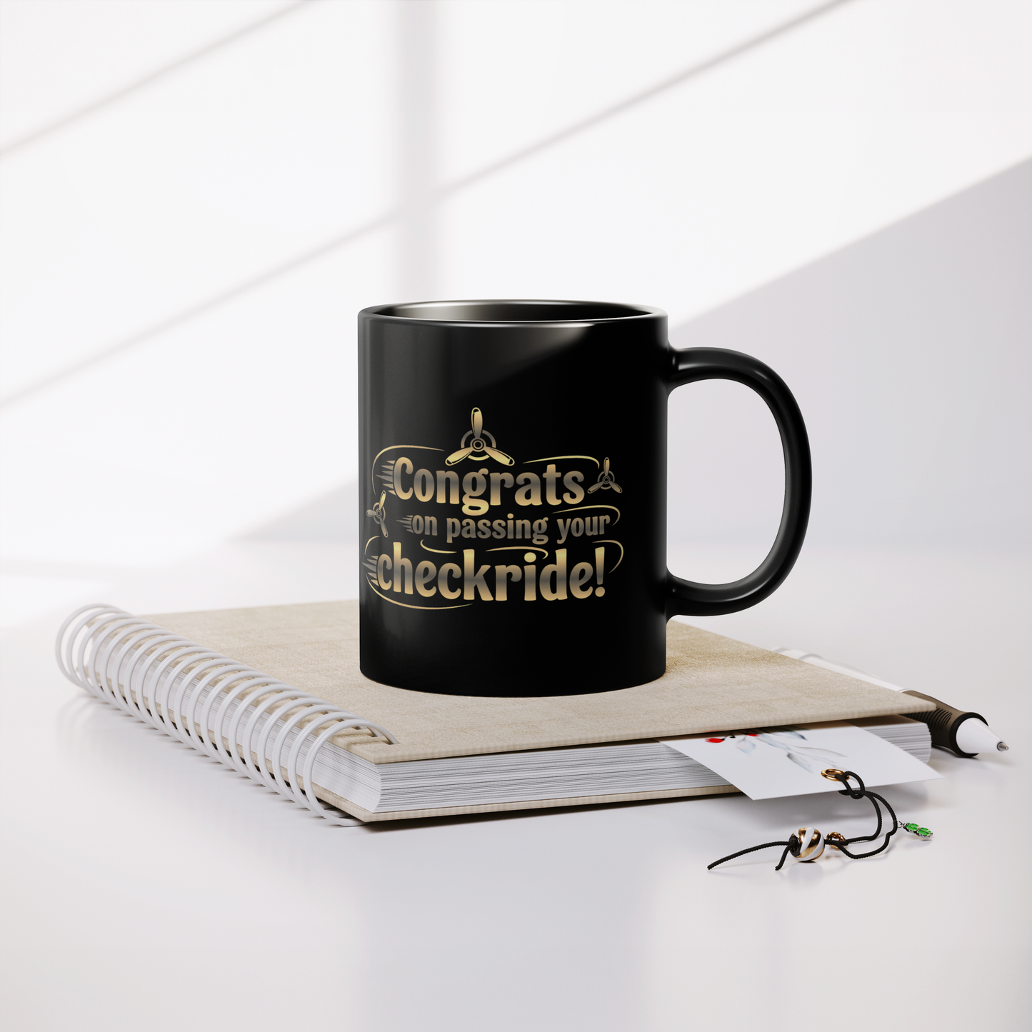 Congrats_on_passing_your_checkride_v3_Lifestyle_Notebook_Mockup.png