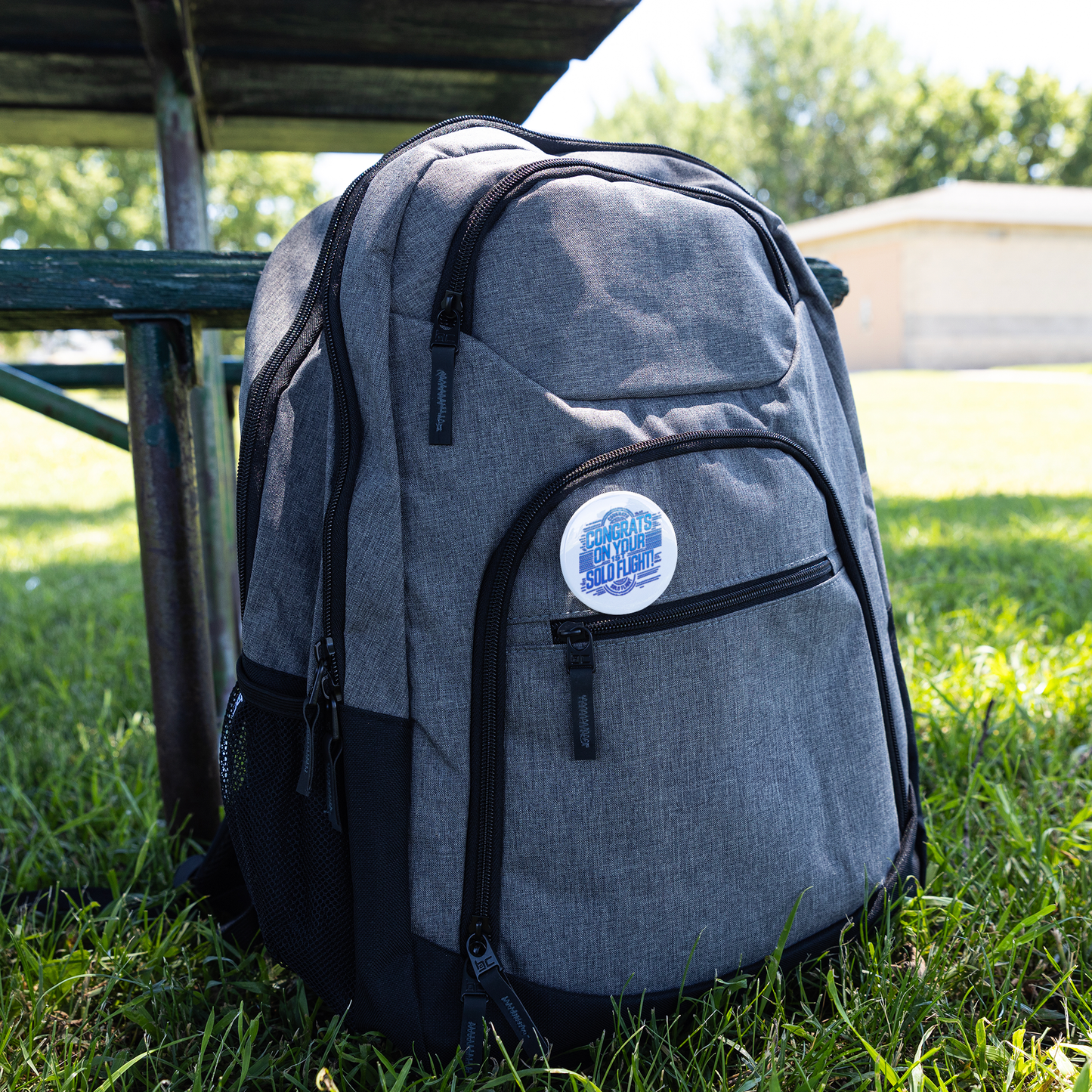 Congrats_on_your_1st_Solo_Flight_pin_bu_Pin_Backpack_Mockup.png