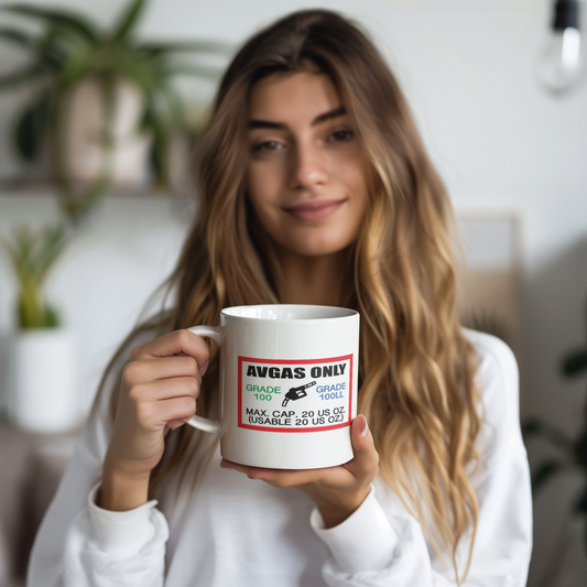 _100LL_fuel_only_20_oz_mug_Model_Holding_LH_Mockup.png