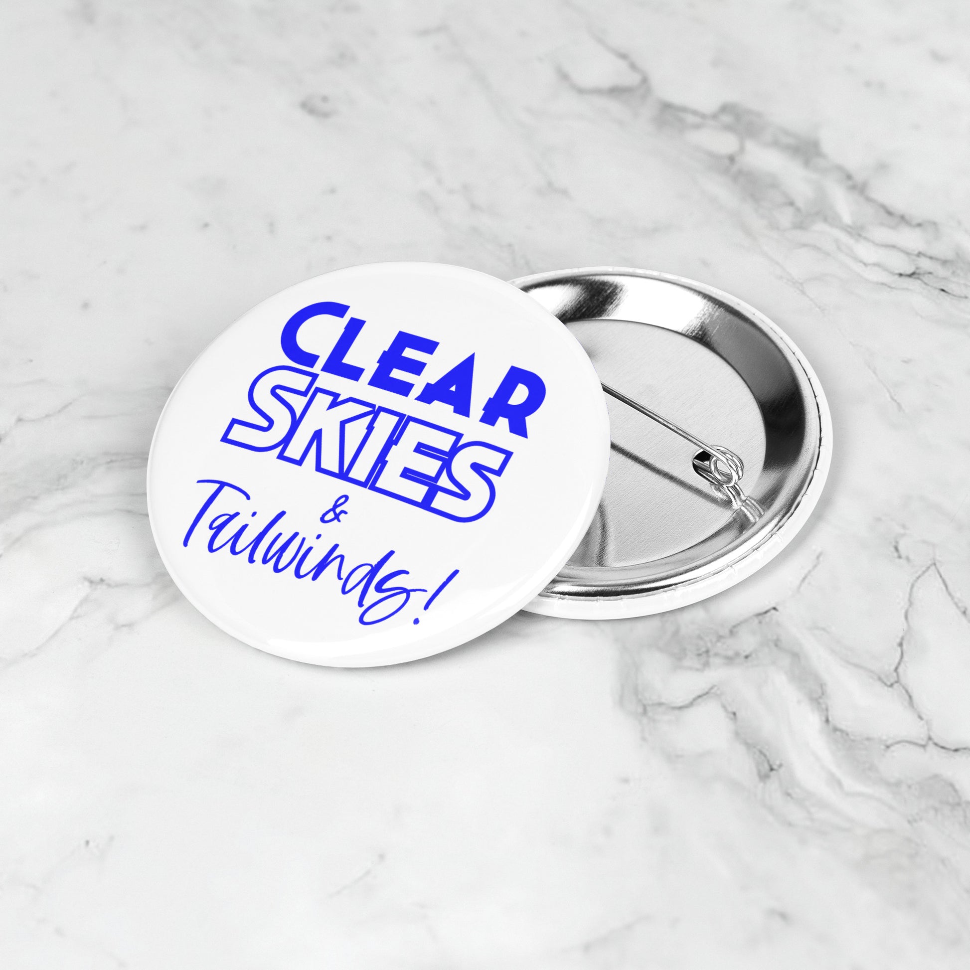 Clear skies & tailwinds! button pin (blue)