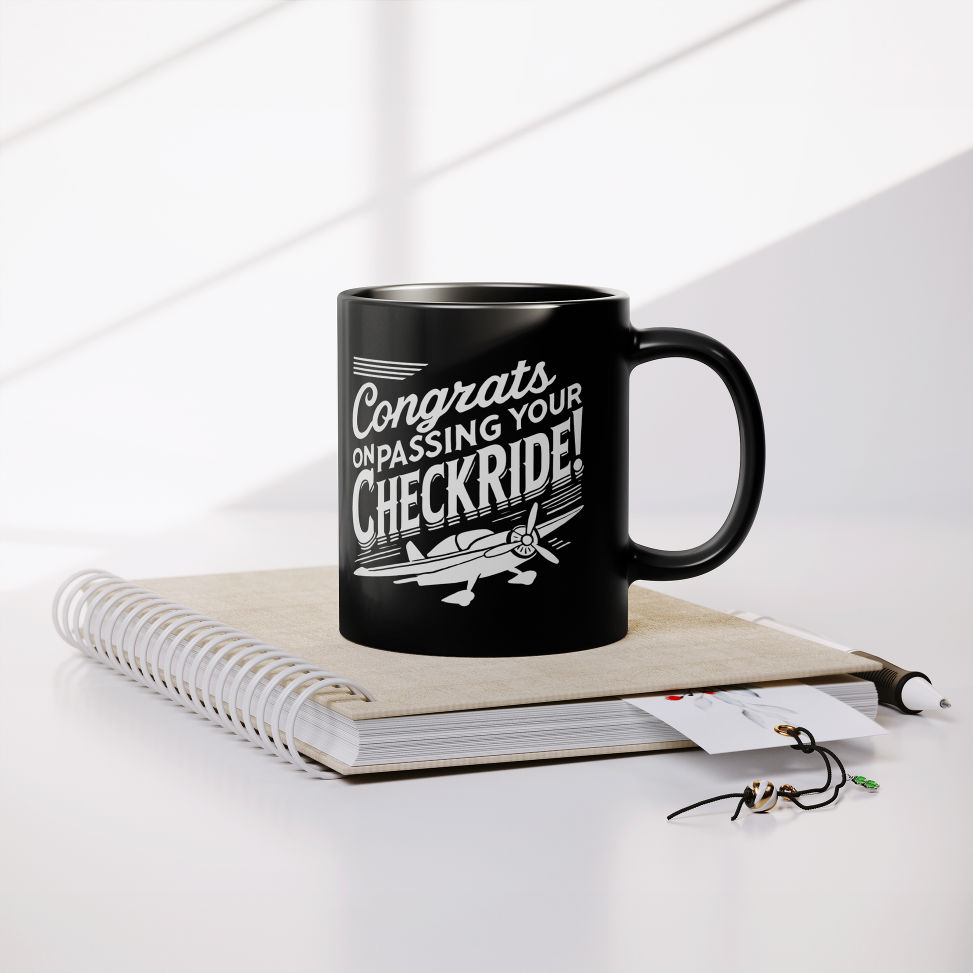 Congrats_on_passing_your_checkride_v1_Lifestyle_Notebook_Mockup.png
