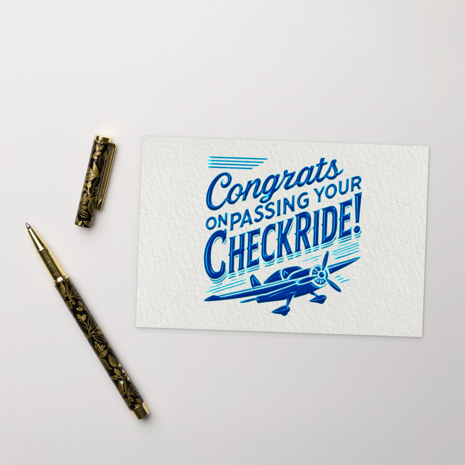 'Congrats on passing your checkride!' text and airplane graphic postcard.