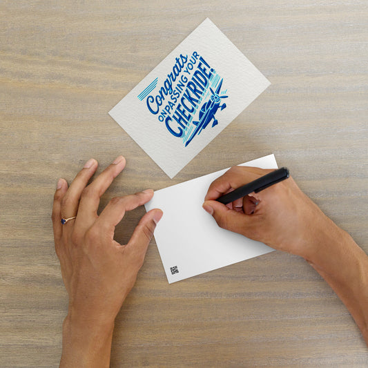 'Congrats on passing your checkride!' text and airplane graphic postcard.