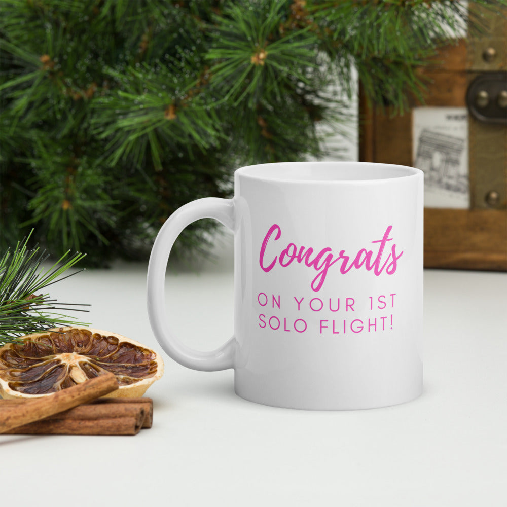 Congrats on your 1st solo flight - white glossy 11oz mug with pink text