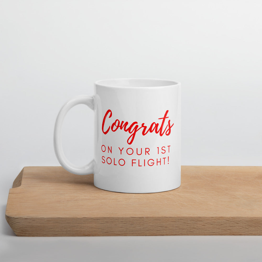 Congrats on your 1st solo flight - white glossy 11oz mug with red text