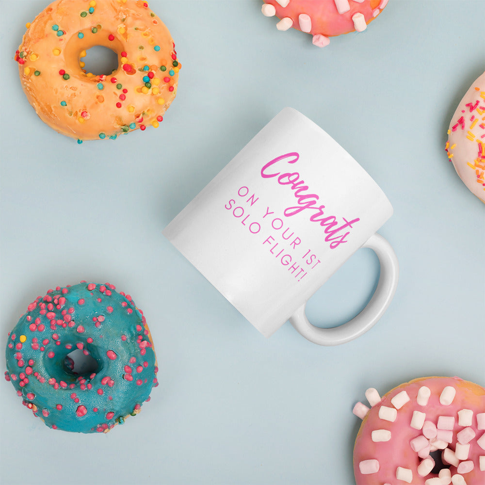 Congrats on your 1st solo flight - white glossy 11oz mug with pink text